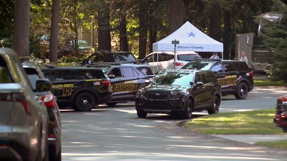 Michigan inferno kills eight, including six kids; gunshot wounds suspected